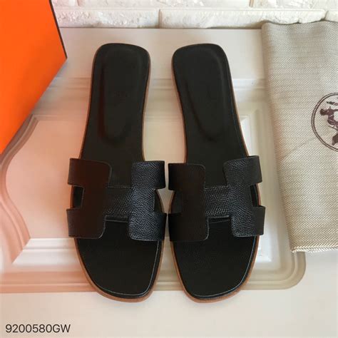 hermes black shoes|Hermes closed slippers.